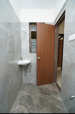 Bathroom in 2 BHK Apartment at Abrol Signature, Malad West – for Sale