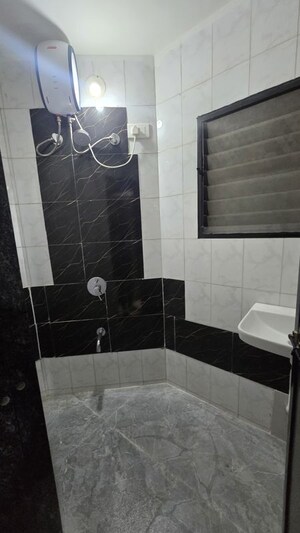 Bathroom in 2 BHK Apartment at Magarpatta City Cosmos, Magarpatta Road – for Rent