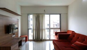 Living Room in 1 BHK Apartment at Cosmos Solitaire, Virar West – for Sale