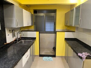 Kitchen in 2 BHK Apartment at Amanora Future Towers, Hadapsar – for Sale