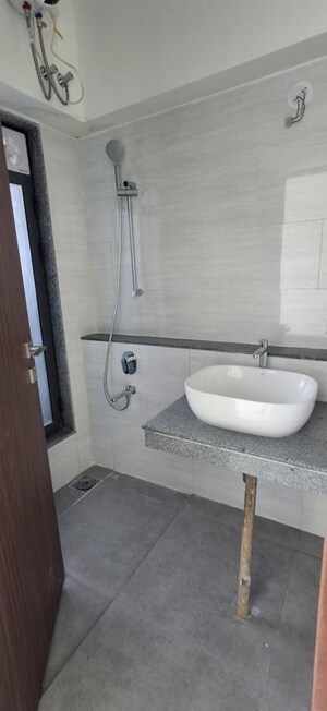 Bathroom in 1.5 BHK Apartment at Dynamix Divum, Malad East – for Rent