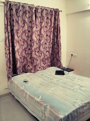 Bedroom in 2 BHK Apartment at Woodland Apartments, Kothrud – for Rent