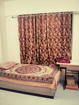 Bedroom in 2 BHK Apartment at Woodland Apartments, Kothrud – for Rent