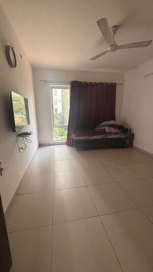 Living Room in 2 BHK Apartment at Magarpatta Grevillea, Hadapsar – for Rent