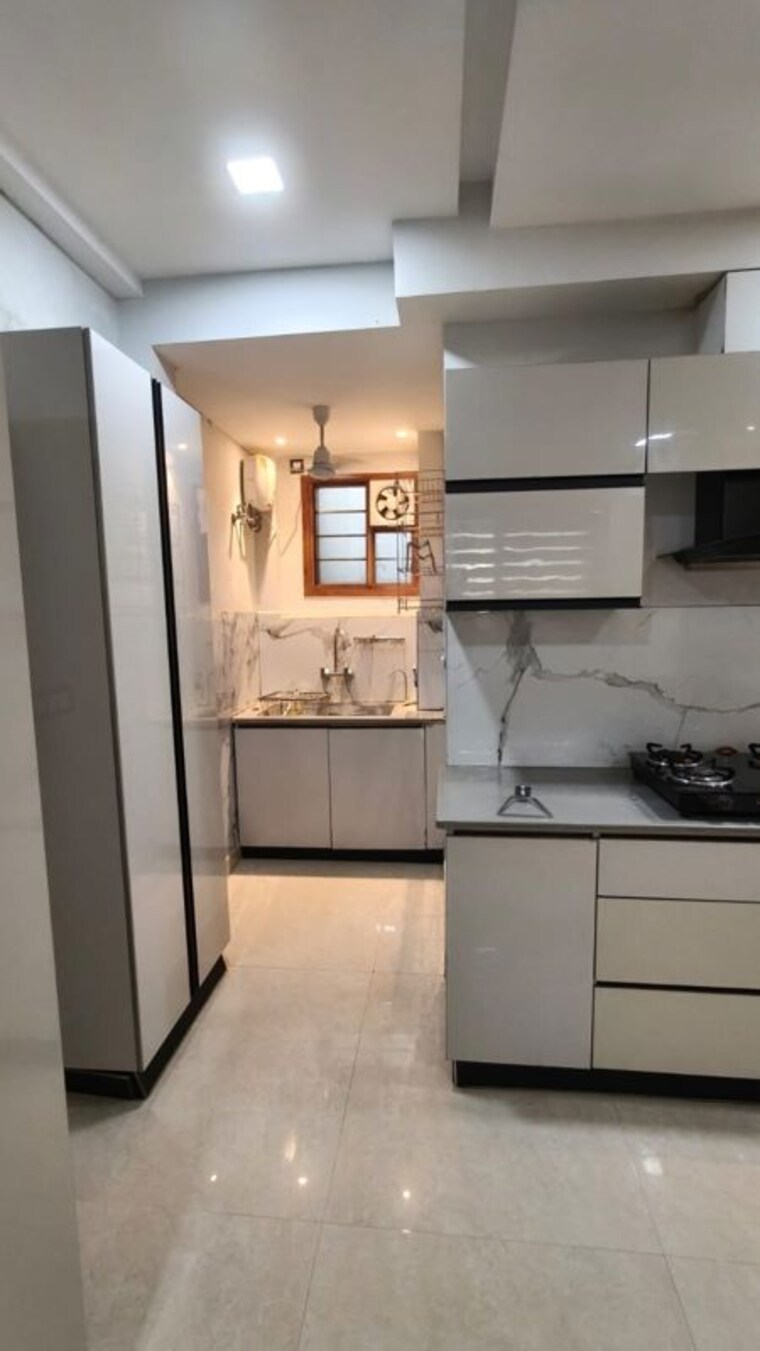 Kitchen, bptp-parkland-pride-phase-2 3 Bedroom 190 Sq.Ft. Builder Floor In Sector 77 Faridabad 10607159