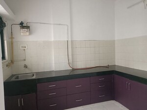 Kitchen in 2 BHK Apartment at Aundh Gaon – for Sale