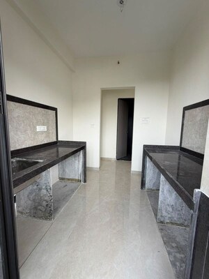 Kitchen in 1 BHK Apartment at Dhamji Shamji Mahavir Spring Tulip Phase 1, Pokhran Road No Two – for Rent