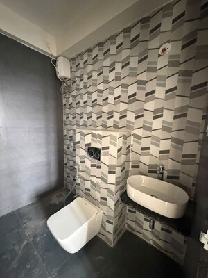Bathroom in 1 BHK Apartment at Dhamji Shamji Mahavir Spring Tulip Phase 1, Pokhran Road No Two – for Rent