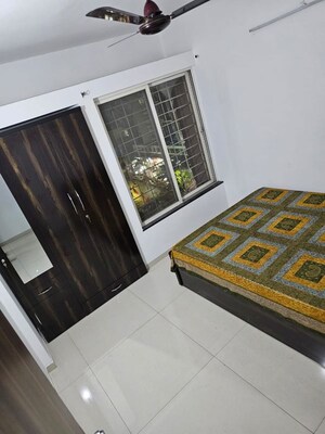 Bedroom in 2 BHK Apartment at Magarpatta City Heliconia, Hadapsar – for Rent