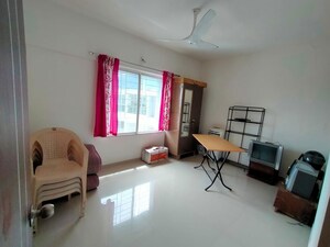 Living Room in 1 BHK Apartment at Magarpatta Annex, Hadapsar – for Rent