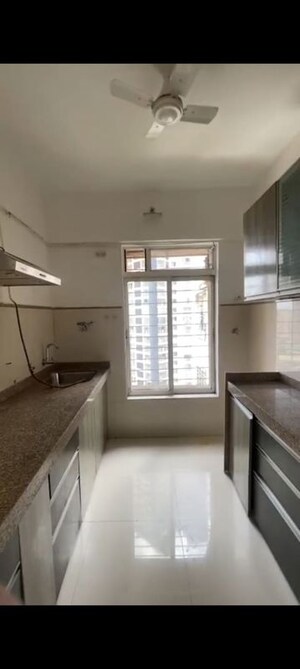 Kitchen in 2 BHK Apartment at Group Seven Rushi Heights, Goregaon East – for Rent