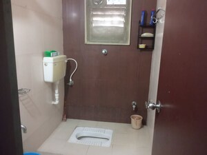 Bathroom in 2 BHK Apartment at Yashoda Heights, Warje – for Rent