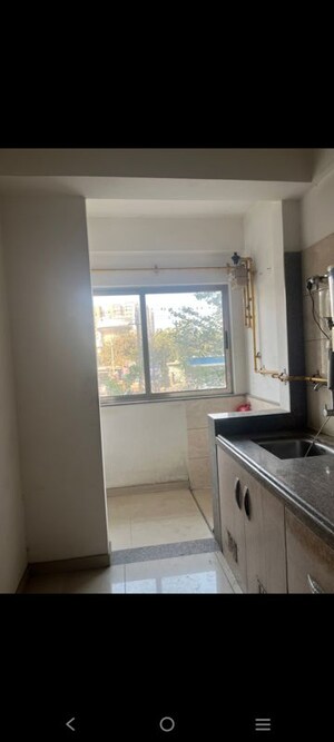 Kitchen in 2 BHK Apartment at Goyal Aakash Residency, Khadia – for Rent