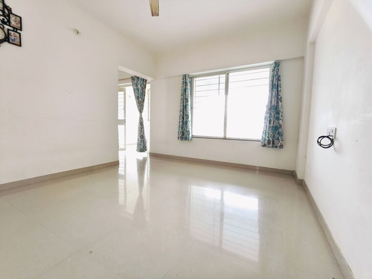 Living Room, sree-mangal-little-hearts 2 Bedroom 1000 Sq.Ft. Apartment In Undri Pune 10607299