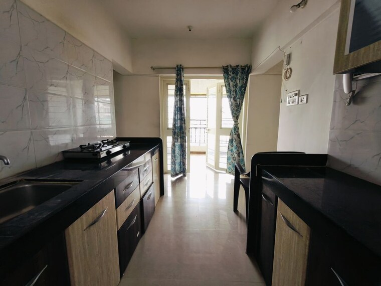 Kitchen, sree-mangal-little-hearts 2 Bedroom 1000 Sq.Ft. Apartment In Undri Pune 10607299