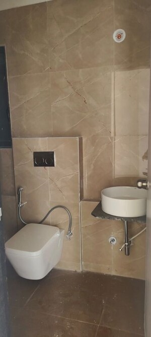Bathroom in 1 BHK Apartment at Dhamji Shamji Mahavir Spring Tulip Phase 1, Pokhran Road No Two – for Rent