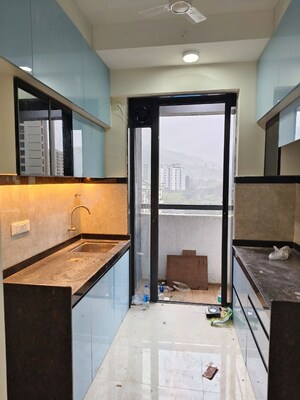 Kitchen in 1 BHK Apartment at Dhamji Shamji Mahavir Spring Tulip Phase 1, Pokhran Road No Two – for Rent