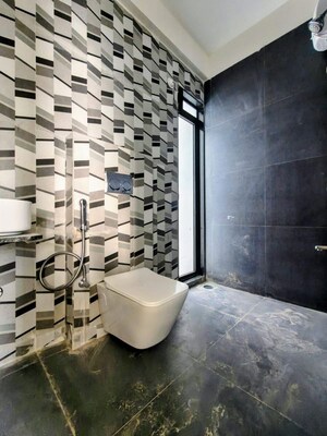 Bathroom in 1 BHK Apartment at Dhamji Shamji Mahavir Spring Tulip Phase 1, Pokhran Road No Two – for Rent