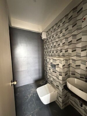 Bathroom in 1 BHK Apartment at Dhamji Shamji Mahavir Spring Tulip Phase 1, Pokhran Road No Two – for Rent