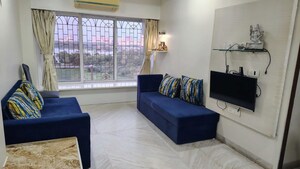 Bedroom in 2 BHK Apartment at Powai Cosmopolitan CHS, Powai – for Rent