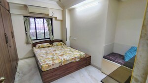 Bedroom in 2 BHK Apartment at Powai Cosmopolitan CHS, Powai – for Rent