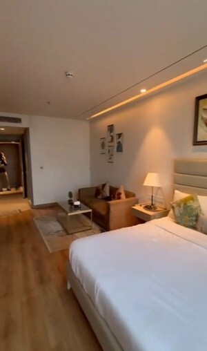 Living Room in Studio Apartment at AIPL Joy Street, Sector 66 – for Rent