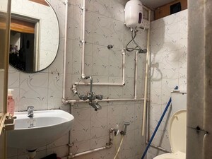 Bathroom in 2 BHK Apartment at Bandra West – for Sale