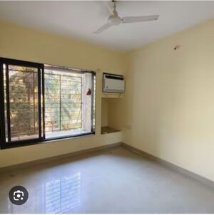 Room in 2 BHK Apartment at Swapnalok Towers, Malad East – for Rent