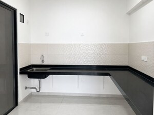 Kitchen in 2 BHK Apartment at Magarpatta Grevillea, Hadapsar – for Rent