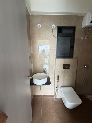 Bathroom in 1 BHK Apartment at Dhamji Shamji Mahavir Spring Tulip Phase 1, Pokhran Road No Two – for Sale