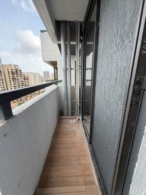 Balcony in 1 BHK Apartment at Dhamji Shamji Mahavir Spring Tulip Phase 1, Pokhran Road No Two – for Sale
