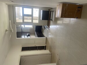Kitchen in 2 BHK Apartment at Shree Vardhman Mantra, Sector 67 – for Rent