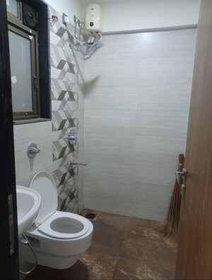 Bathroom in 1 BHK Apartment at Harasiddh Viraaj, Malad East – for Rent