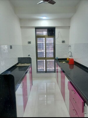 Kitchen in 1 BHK Apartment at Harasiddh Viraaj, Malad East – for Rent