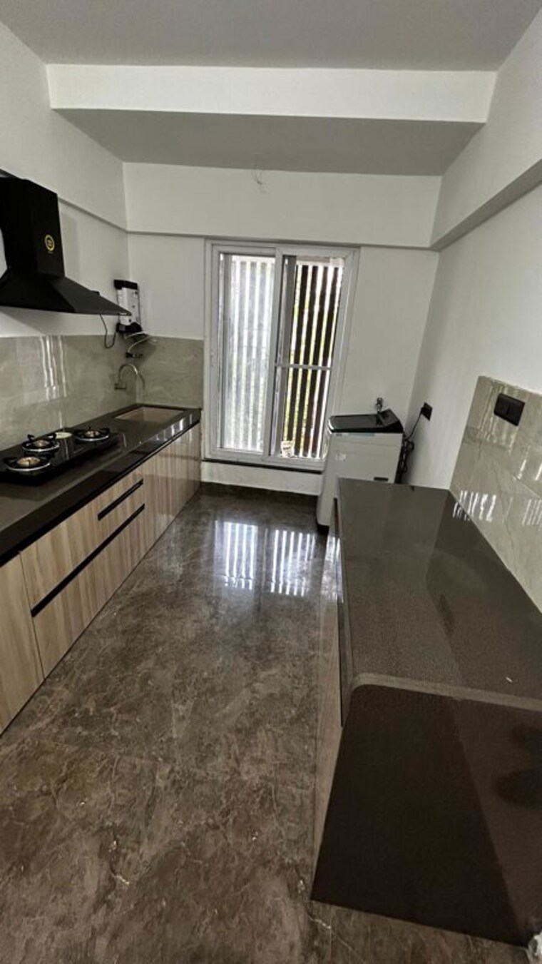 Kitchen, magarpatta-jasminium 2 Bedroom 900 Sq.Ft. Apartment In Hadapsar Pune 10607516
