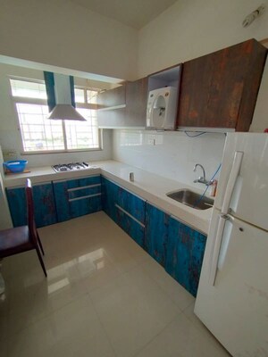 Team Area in 2 BHK Apartment at Magarpatta City Roystonea, Hadapsar – for Rent