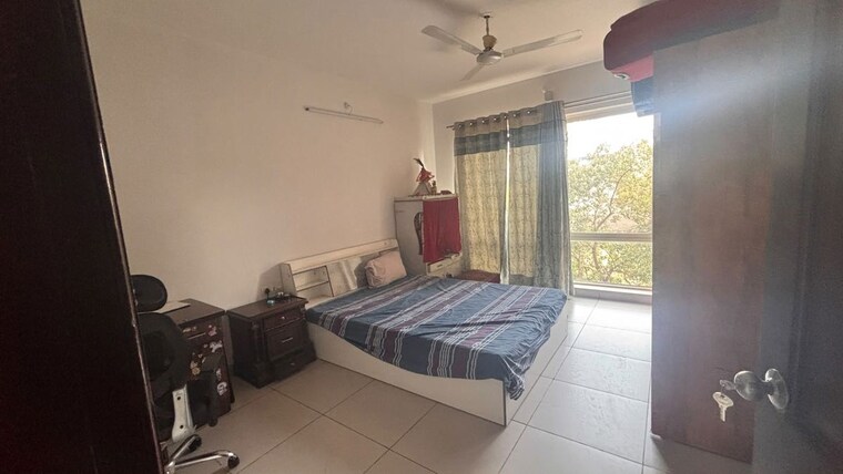 Bedroom, magarpatta-city-cosmos 2 Bedroom 900 Sq.Ft. Apartment In Magarpatta Road Pune 10607570