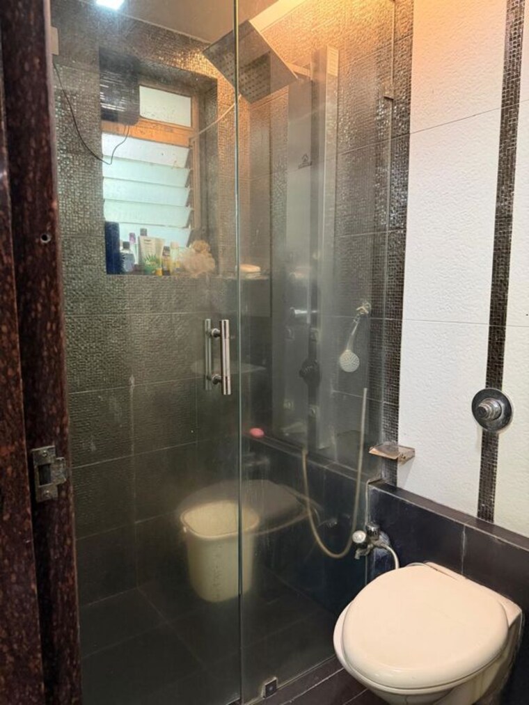 Bathroom, naman-habitat 2 Bedroom 837 Sq.Ft. Apartment In Andheri West Mumbai 10607576