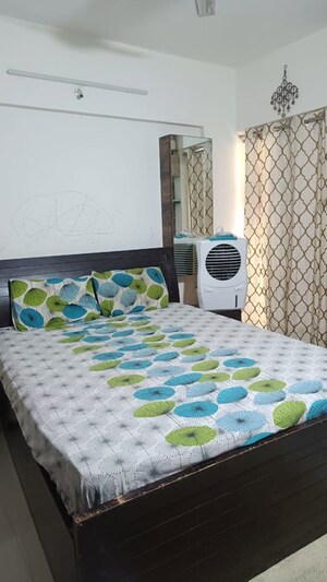 Bedroom in 2 BHK Apartment at Magarpatta Grevillea, Hadapsar – for Rent