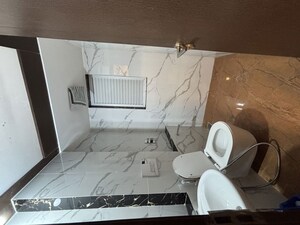 Bathroom in 2 BHK Apartment at Ruparel Ariana, Parel – for Rent