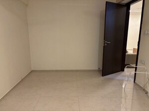 Bedroom in 2 BHK Apartment at Ruparel Ariana, Parel – for Rent