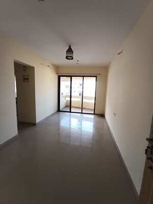 Living Room in 1 BHK Apartment at Ajmera Yogi Dham Phase III, Kalyan West – for Sale