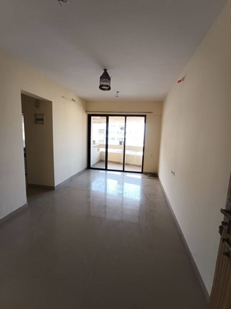 Living Room, ajmera-yogi-dham-phase-iii 1 Bedroom 635 Sq.Ft. Apartment In Kalyan West Thane 10607595