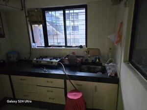Kitchen in 3 BHK Apartment at Magarpatta Grevillea, Hadapsar – for Rent