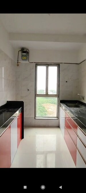 Kitchen in 2 BHK Apartment at Dharti Pressidio, Kandivali West – for Sale