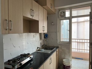 Kitchen in 3 BHK Apartment at Mahagun Moderne, Sector 78 – for Sale