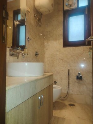 Bathroom in 4 BHK Builder Floor at New Friends Colony – for Rent