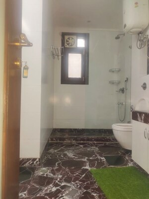 Bathroom in 4 BHK Builder Floor at New Friends Colony – for Rent