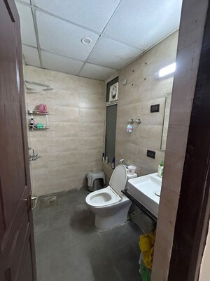 Bathroom in 3 BHK Apartment at Emenox Brave Hearts, Raj Nagar Extension – for Rent