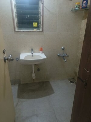 Bathroom in 2 BHK Apartment at Manav Silver Skyscapes, Wakad – for Rent